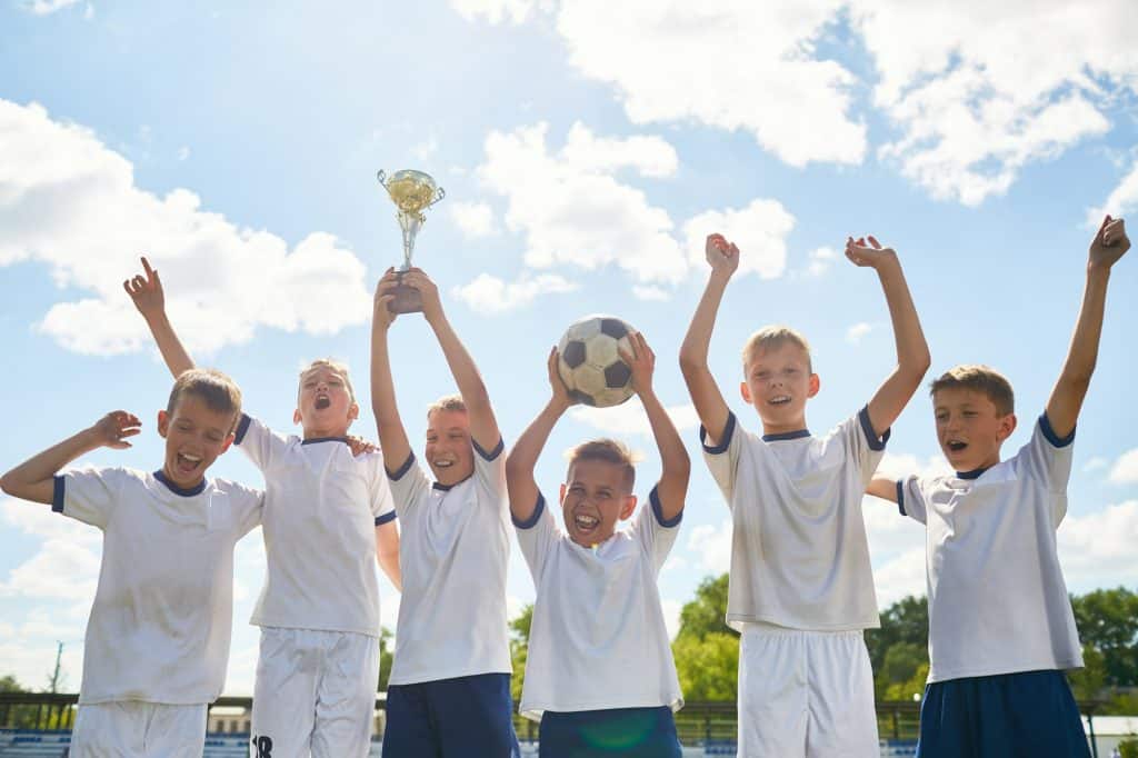 Boys Football Team Winning Champions Cup